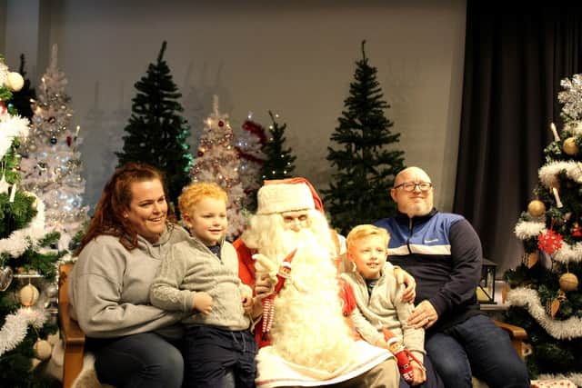 Mum Rebecca, little brother Cody, Caleb and dad Kurt pay Santa a visit in Lapland