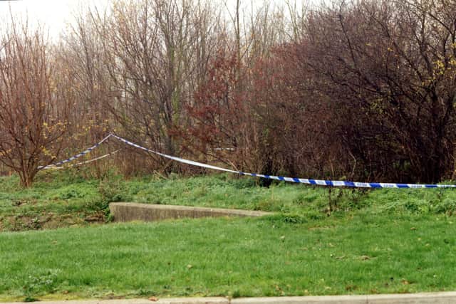Police tape cordoning off the woods next to the Welland Estate in Peterborough, near to where Rikki Neave’s body was found.