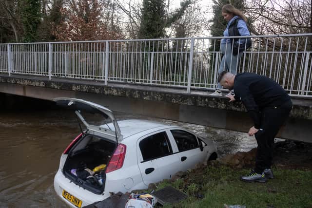 Liam Stych and Tia Draper rescuers who saved a woman and her child from a submerged car on Green Lane, in Hall Green, Birmingham.