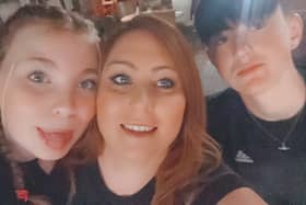 English woman Zoe Coles, who woke up one day speaking with a Welsh accent. Zoe is pictured here with daughter Brooke and son Zak.