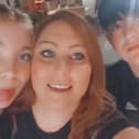 English woman Zoe Coles, who woke up one day speaking with a Welsh accent. Zoe is pictured here with daughter Brooke and son Zak.