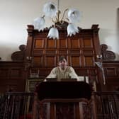 Wayne Colquhoun stands at the pulpit in the former Chapel Salem.