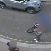 Shocking moment teen snatches phone from stranger