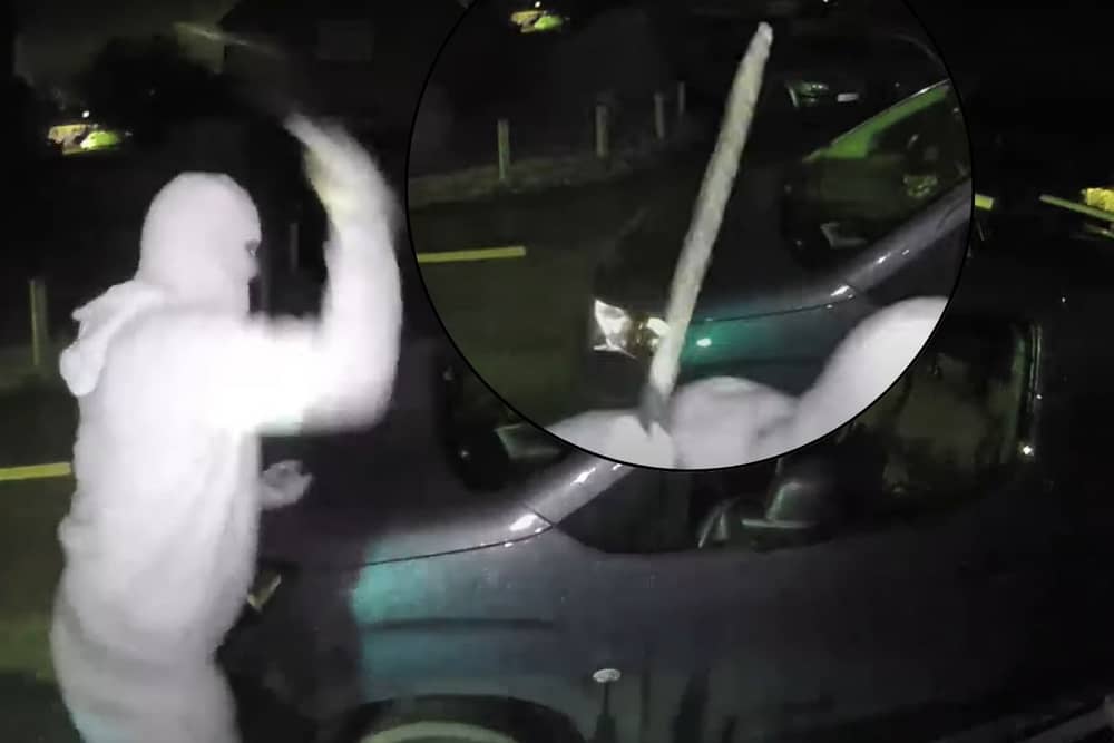Nathan Smith, 33, has been jailed for 5 years. Here he is smashing the windscreen of a vehicle, while wearing a balaclava, gloves and brandishing a machete.