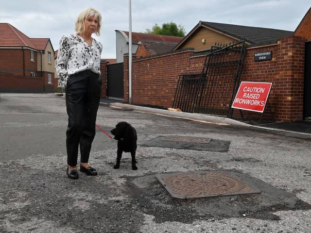  Residents have blasted developers after paying £550,000 to live on 'desolate' newbuild estate which remains unfinished - FIVE years after people moved in. Pictured: Lin Glover