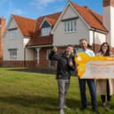 BOTB presenters Christian Williams (right) and Katie Knight (left) with the Robert Everson and his wife Carleane in front of their new dream home