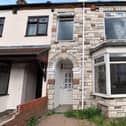Jo Hodges, the city council's senior neighbourhoods enforcement officer, outside the property at 269 Cromwell Road, which had fallen into a bad condition after being a HMO, and the landlords were prosecuted by the council in court last week.