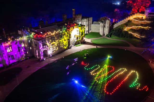 The Light Trail at Warwick Castle covers 64 acres of grounds with over half a million twinkling lights, projections and glowing displays