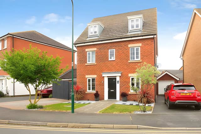This substantial detached home makes a strong first impression with family-friendly space extending well beyond the front door.