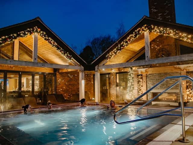 The heated outdoor vitality pool is at the heart of the Moddershall Oaks spa experience, with countryside views and cocktails delivered straight to the water.