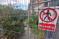 The path at Henry Penn Walk has been closed off for years as a result of the sinkhole