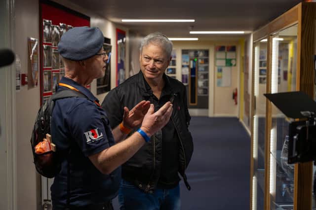 Gary Sinise meets with Stuart Ainsworth from Royal British Legion to discuss WW2 memorabilia