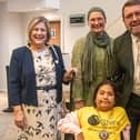 Shine member Maryam meeting the Mayor of Peterborough and trying on his mayoral chain