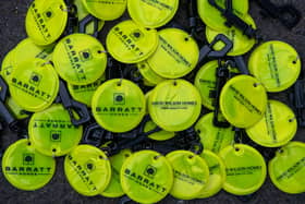 BG - Barratt and David Wilson Homes' hi-vis bag tags for Bright Journeys