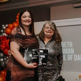 Elizabeth and Rona receiving their award.