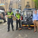 Andrew alongside local police performing a 'stop and seize' of E-scooters in the city centre