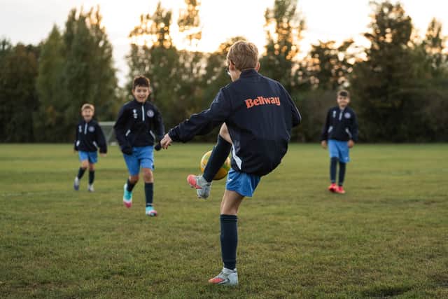 Thorpe Wood Rangers Under 11s practising in their new training tops sponsored by Bellway.
