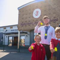 Housebuilder marks International Walk to School Month by donating hi-vis bag tags