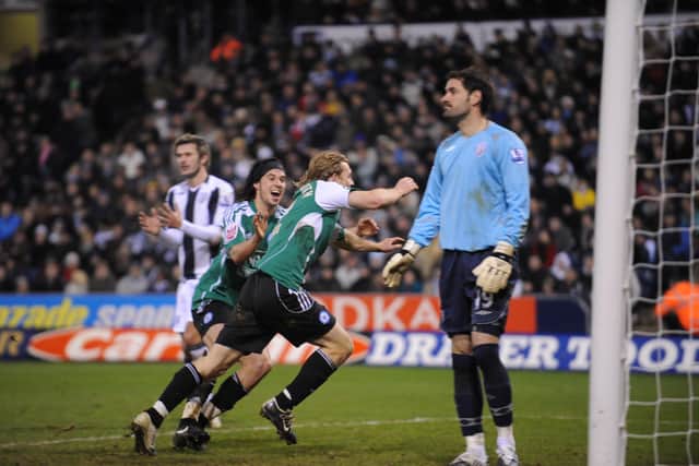 Craig Mackail-Smith celebates an FA Cup goal for Posh at West Brom.