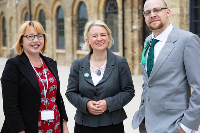 Former Green Party leader Natalie Bennett (centre) with candidates Nicola Day and Joseph Wells at Fletton Quays in Peterborough