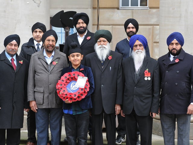 Remembrance Sunday in Peterborough City Centre. Sikhs who laid a wreath at the memorial. EMN-191011-212211009