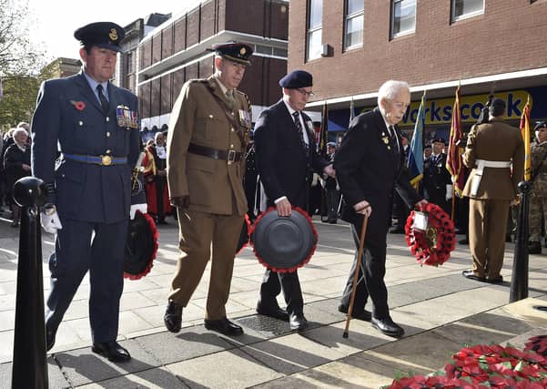 Remembrance Sunday in Peterborough City Centre. Wreath laying at the memorial EMN-191011-212849009
