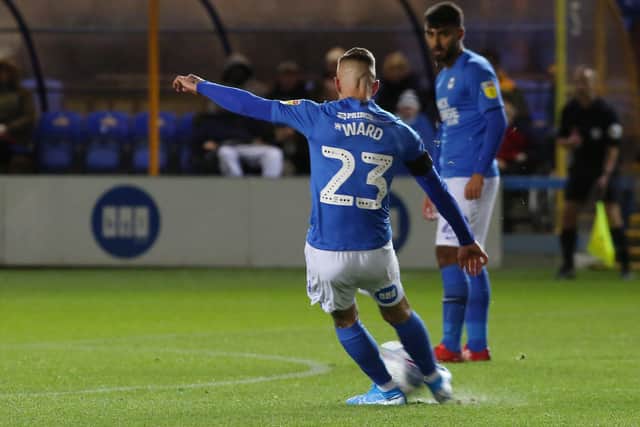 Joe Ward opens the scoring for Posh against Cambridge. Photo: Joe Dent/theposh.com.