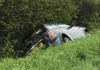 The car which overturned on the B1043. Photo: Cambridgeshire police