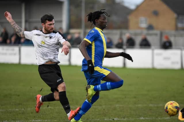 Maniche Sani is tripped to win Peterborough Sports a penalty against Bromsgrove Sporting. Photo: James Richardson.