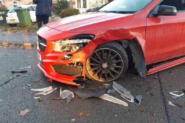 A damaged car in Ledbury Road after a crash