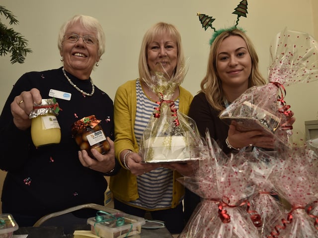 Sue Ryder Christmas Fair at Thorpe Hall. Volunteers Vi Bains, Marilyn Garner and Joely Garner. EMN-191124-132624009
