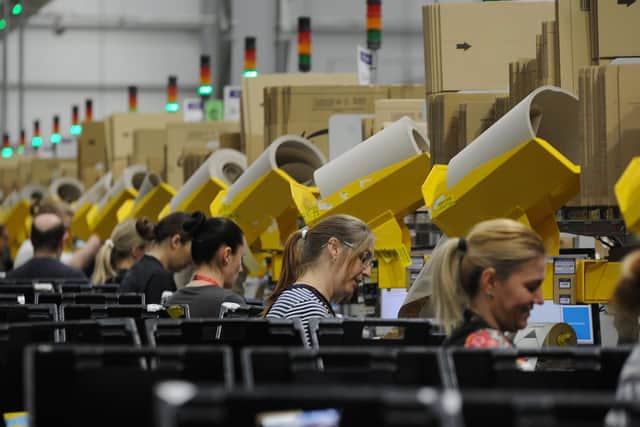 Staff at Amazon Peterborough prepare for the Black Friday rush.