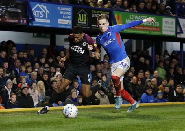 Nathan Thompson (left) in action for Posh at Portsmouth earlier this month.