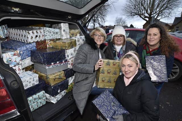 Christmas shoebox handouts to homeless at Brook Street car park. Organisers Diane Malyon, Emma Fleming, Diane Ellison and Nicki Mussett. EMN-190912-101311009