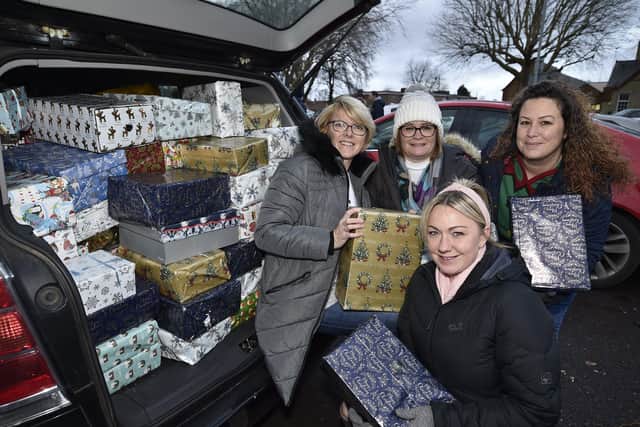 Christmas shoebox handouts to homeless at Brook Street car park. Organisers Diane Malyon, Emma Fleming, Diane Ellison and Nicki Mussett. EMN-190912-101311009