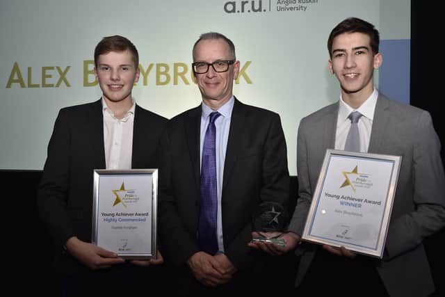 Peterborough Telegraph Pride in Peterborough Awards 2019.  Sponsor Roderick Watkins, vice chancellor of Anglia Ruskin University with Young Achiever of the Year winner Alex Brfaybrook and runner-up Frankie Fordham EMN-191012-002934009