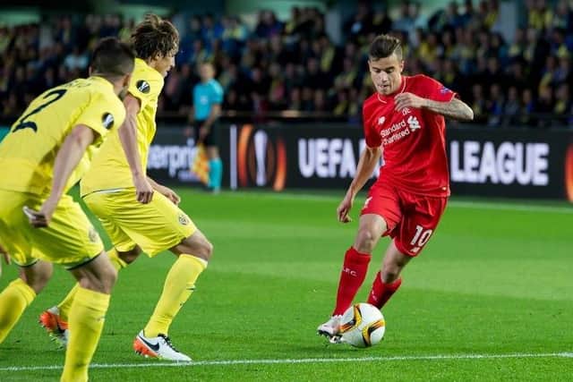 Philippe Coutinho (red).