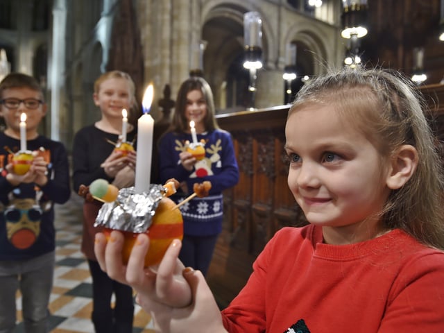 CHristingle service at Peterborough Cathedral. Thea Buffham with (at back) Ethan Jones, Imogen Buffham and Bethany Jones
Nat19 EMN-191220-191548009