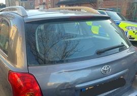 The car had a smashed screen and no rear view mirror