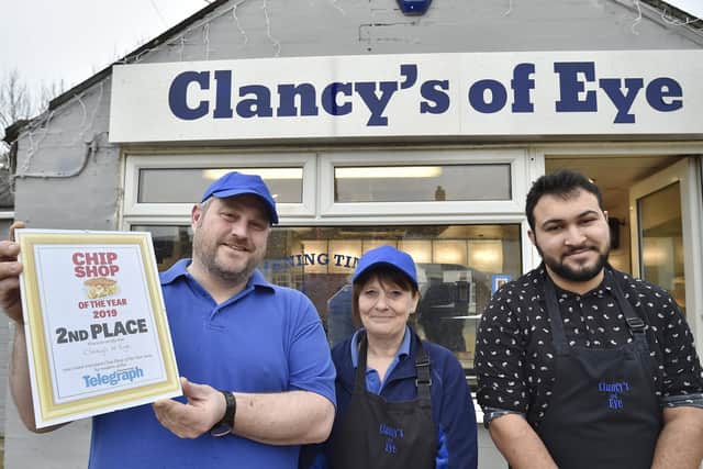 Peterborough Telegraph Chip Shop of the Year  second place -  Rob Cockerill, Isobel Williams and Simeon Betts at Clancy's of Eye. EMN-200701-145634009