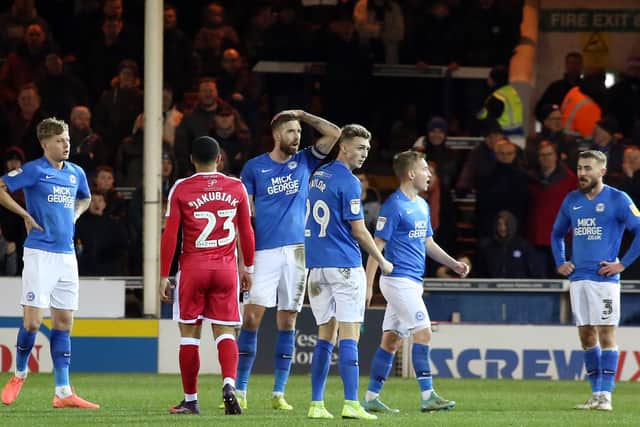 Posh skipper Mark Beevers reacts to his red card against Gillingham. Photo: Joe Dent/theposh.com.