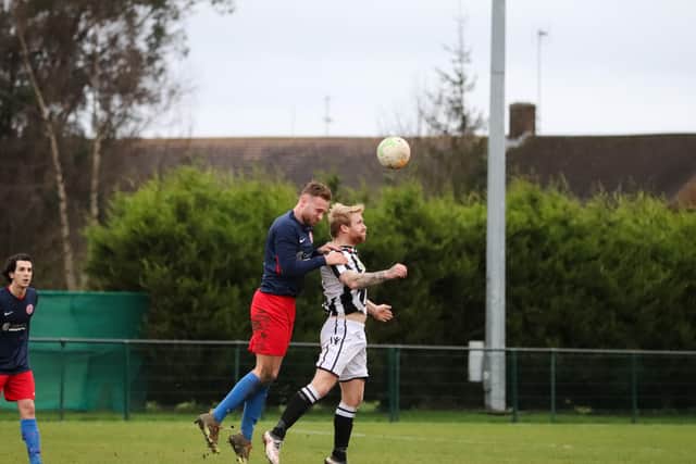 Craig Smith (stripes) in action for Peterborough Nothern Star v Anstey Nomads. Photo: James Cox.
