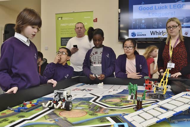 Whirlpool First Lego League for local school taking place at Whirlpool at Morley Way. EMN-200118-154030009