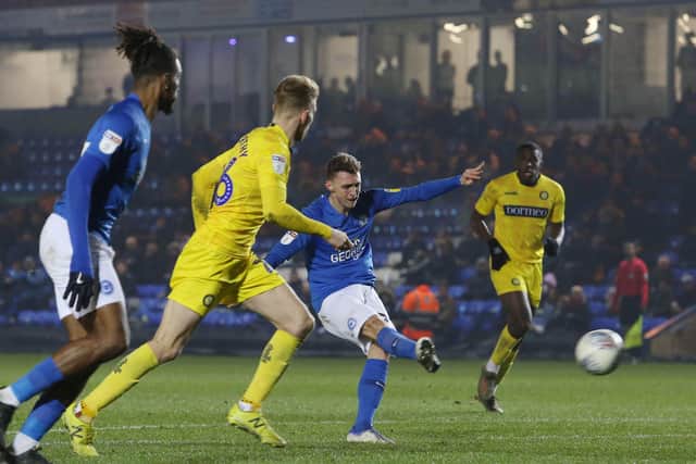 Jack Taylor of Peterborough United scores his side's third goal of the game against Wycombe Wanderers. Photo: Joe Dent/theposh.com.