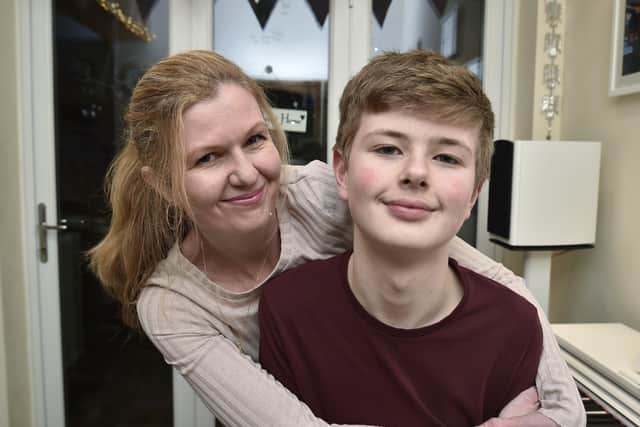 Young musician Tom Dunleavy with his mum Sara Dunleavy who have appeared on a CBBC TV talent show. EMN-200121-203801009