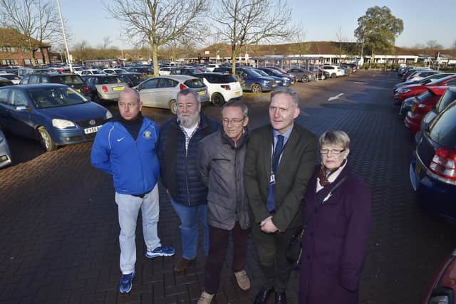 Andy Simmonds, Cllr John Fox, Cllr Stephen Lane, Bryan Erwin and Cllr Judy Fox at the car park in the Werrington Centre