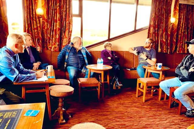 MP Paul Bristow (second from left) at a meeting to discuss the parking issue