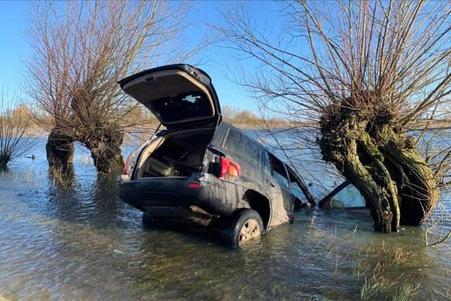 One of the cars which became stuck on the road. Photo: Cambridgeshire police