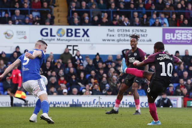 Siriki Dembele of Peterborough United scores his sides third goal of the game at Ipswich.  Photo: Joe Dent/theposh.com.