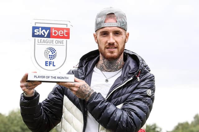 Marcus Maddison with his League One player-of-the-month award.